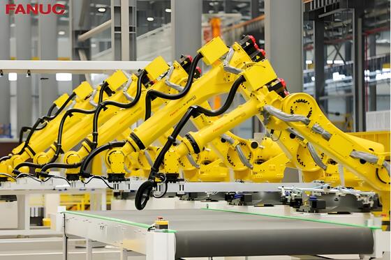 Célula de corte a laser FANUC com carga/descarga automática e mesa giratória para produção em massa de peças metálicas 3D na indústria automotiva